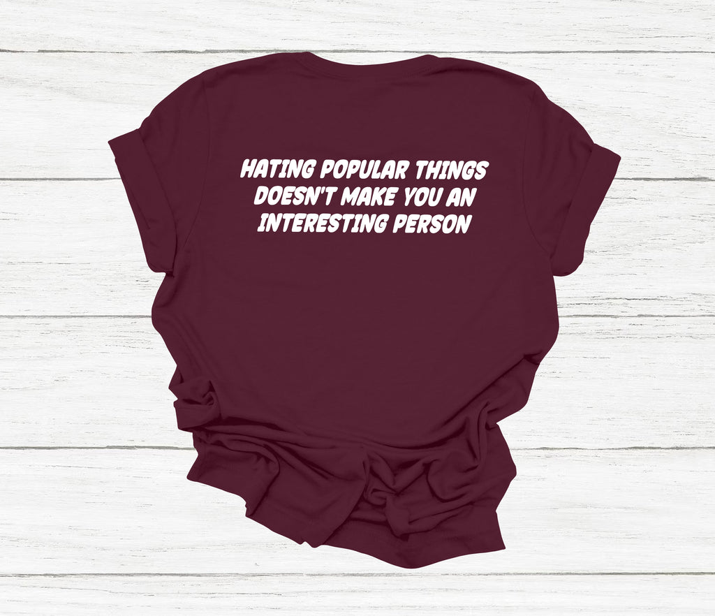 Get trendy with Hating Popular Things T-Shirt - T-Shirt available at DizzyKitten. Grab yours for £12.99 today!