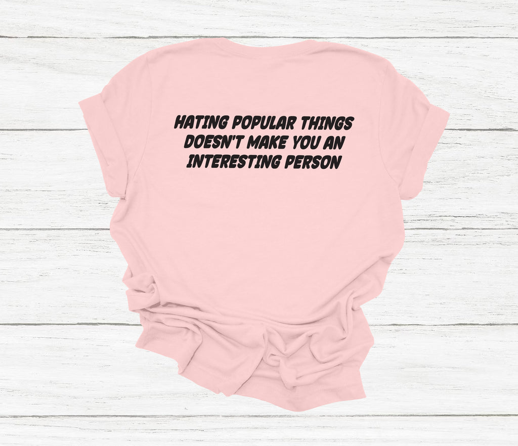 Get trendy with Hating Popular Things T-Shirt - T-Shirt available at DizzyKitten. Grab yours for £12.99 today!