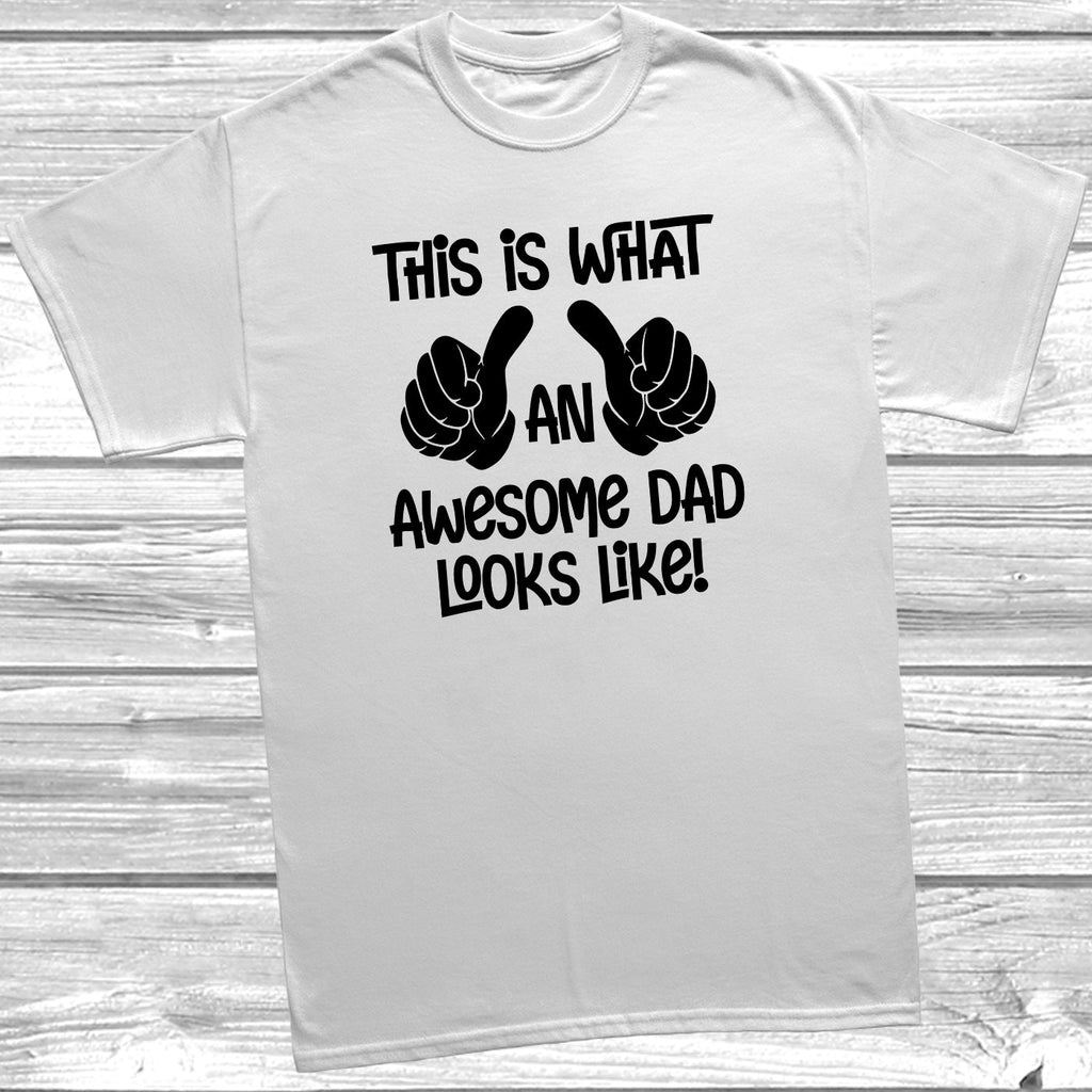 Get trendy with This Is What An Awesome Dad Looks Like T-Shirt - T-Shirt available at DizzyKitten. Grab yours for £8.99 today!