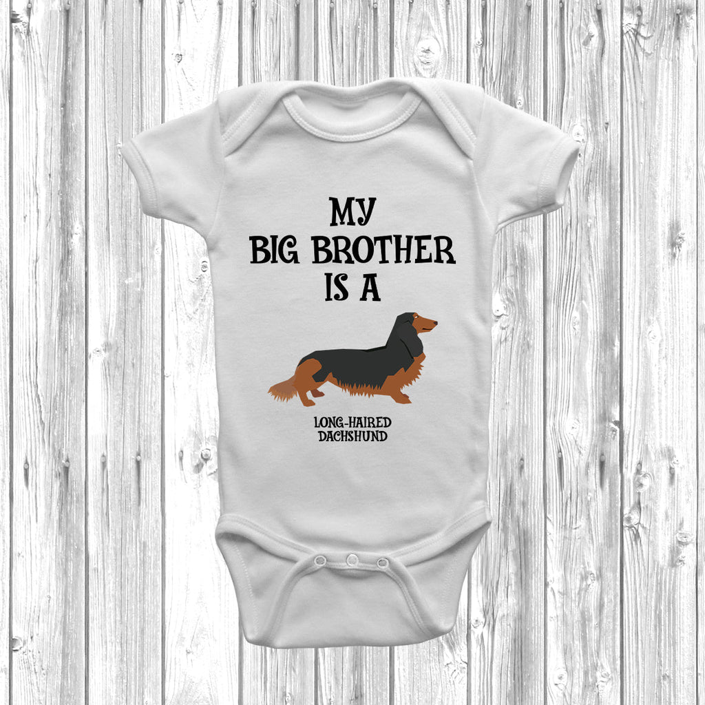 Get trendy with My Big Brother Is A Long-Haired Dachshund Baby Grow -  available at DizzyKitten. Grab yours for £9.45 today!