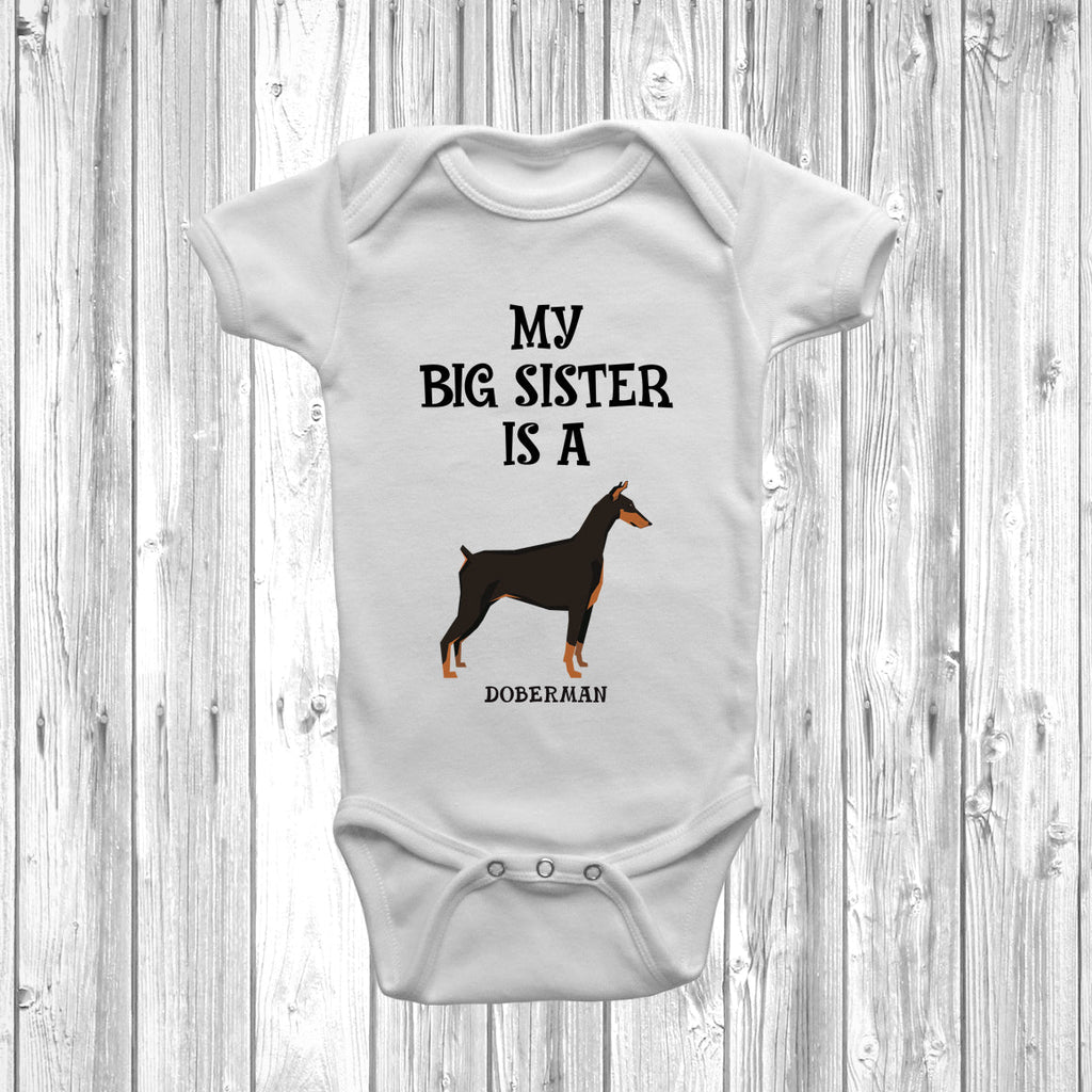 Get trendy with My Big Sister Is A Doberman Baby Grow -  available at DizzyKitten. Grab yours for £9.45 today!