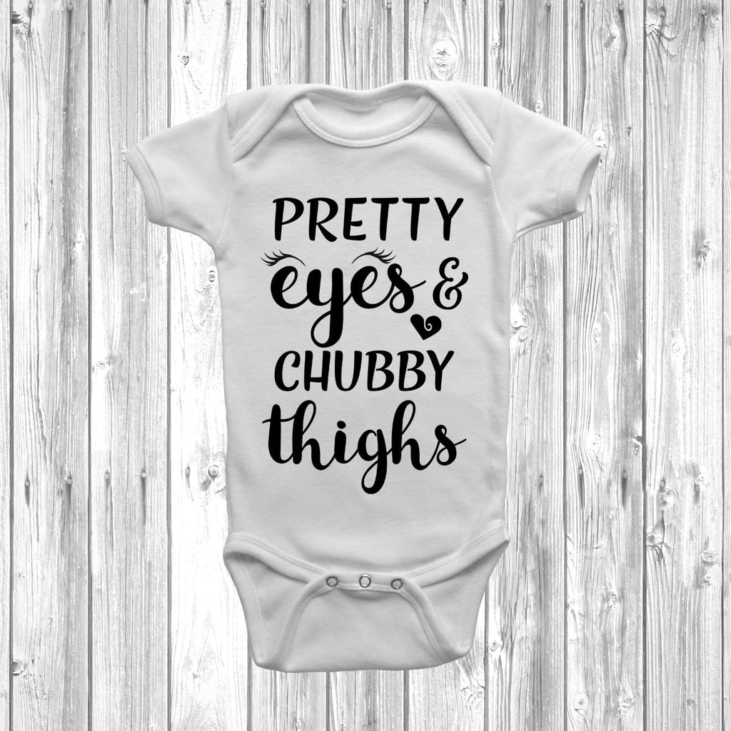 Get trendy with Pretty Eyes And Chubby Thighs Baby Grow - Baby Grow available at DizzyKitten. Grab yours for £8.45 today!
