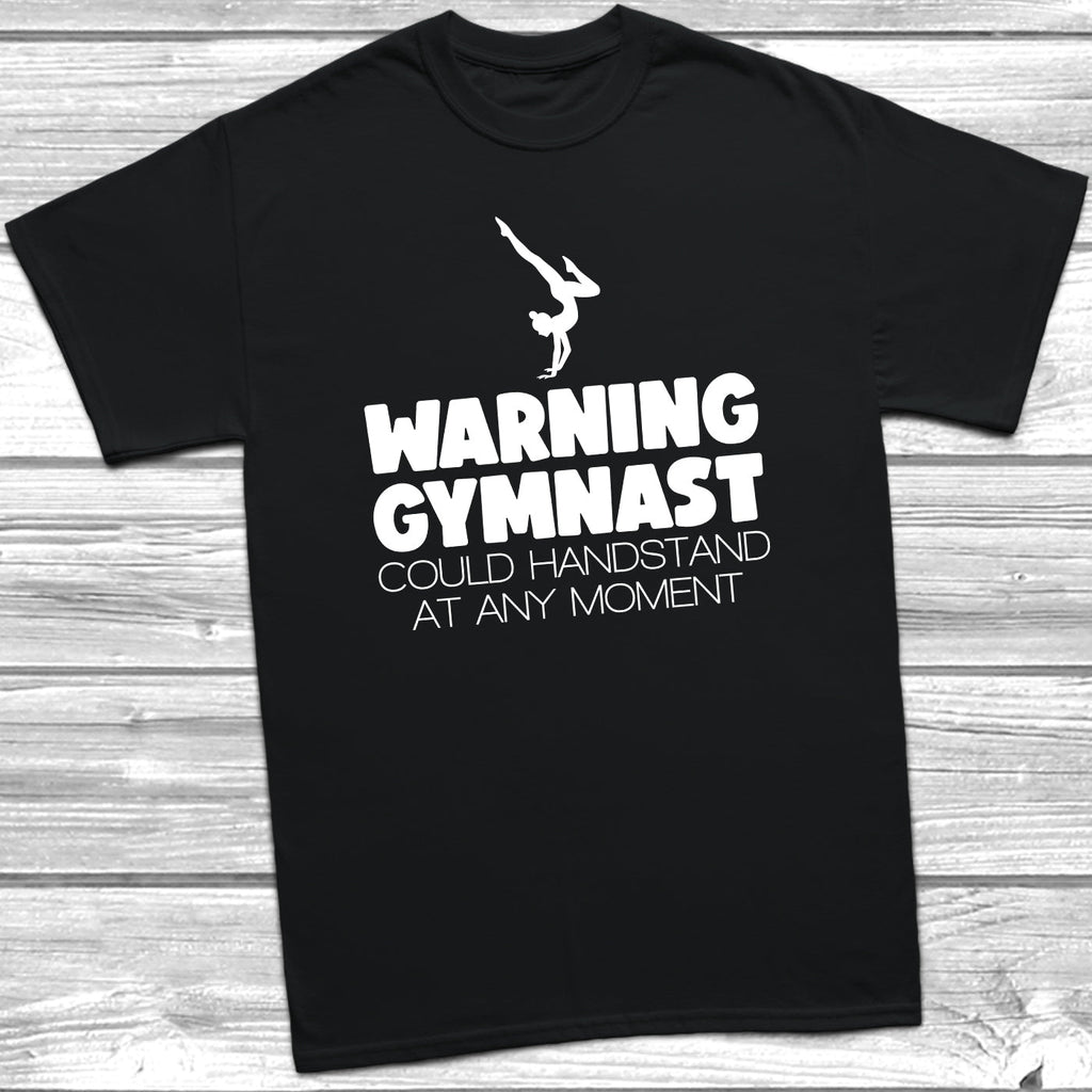 Get trendy with Warning Gymnast Could Handstand T-Shirt - T-Shirt available at DizzyKitten. Grab yours for £9.49 today!