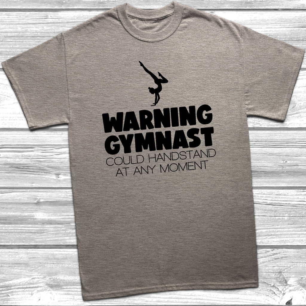 Get trendy with Warning Gymnast Could Handstand T-Shirt - T-Shirt available at DizzyKitten. Grab yours for £9.49 today!