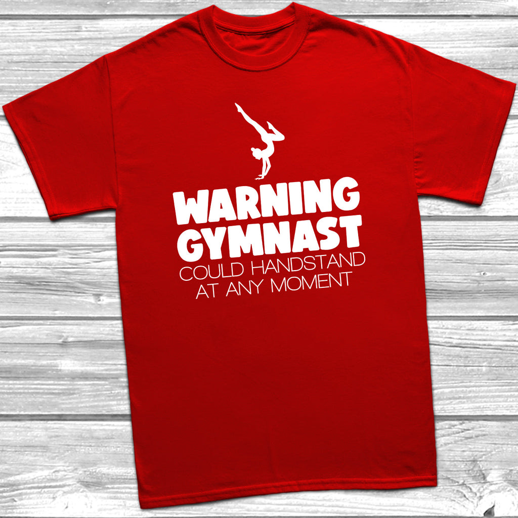 Get trendy with Warning Gymnast Could Handstand T-Shirt - T-Shirt available at DizzyKitten. Grab yours for £9.49 today!