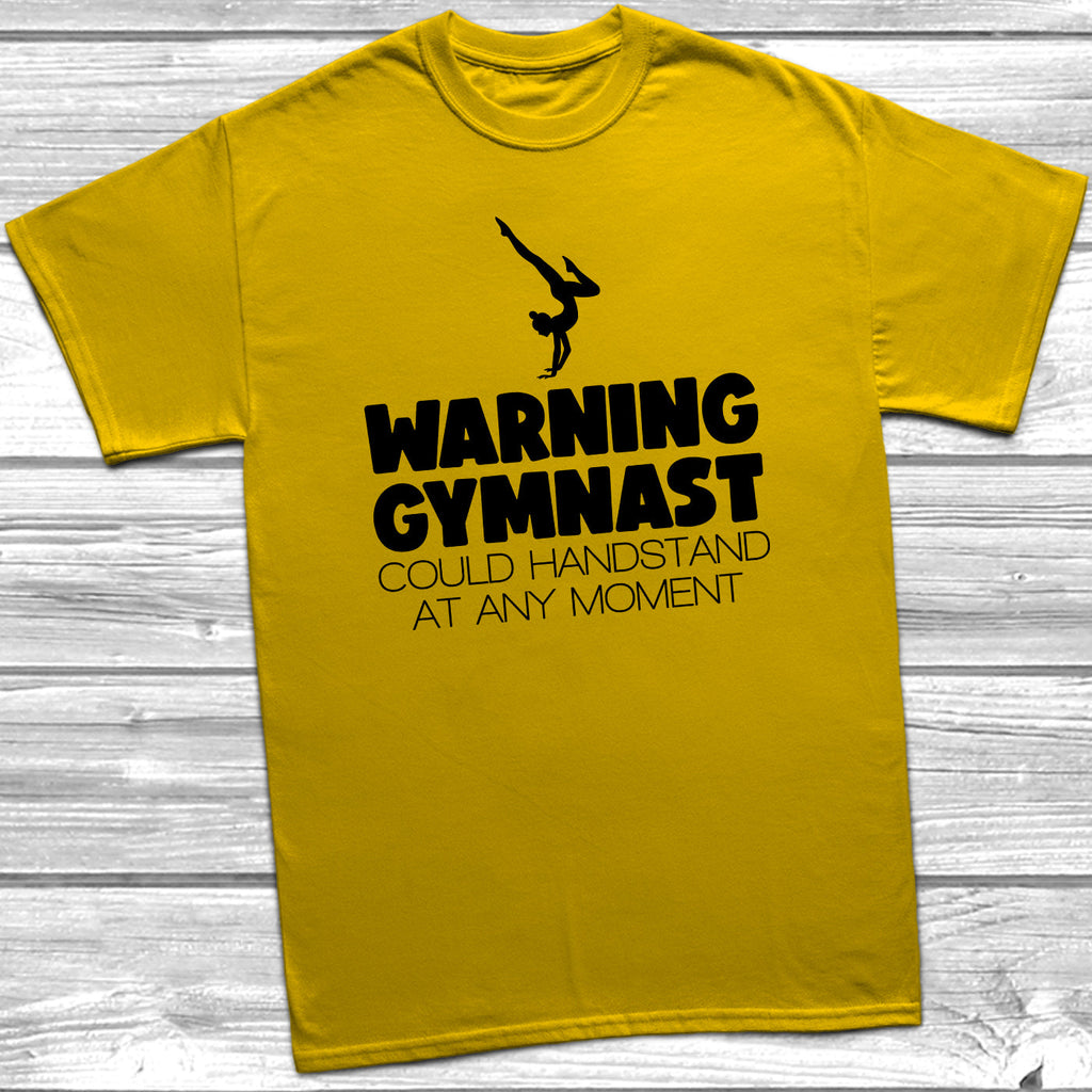 Get trendy with Warning Gymnast Could Handstand T-Shirt - T-Shirt available at DizzyKitten. Grab yours for £9.49 today!