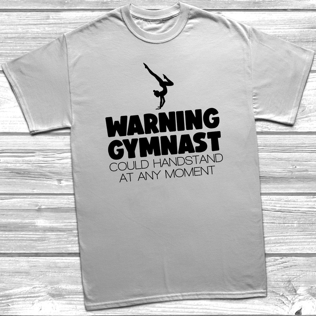 Get trendy with Warning Gymnast Could Handstand T-Shirt - T-Shirt available at DizzyKitten. Grab yours for £9.49 today!