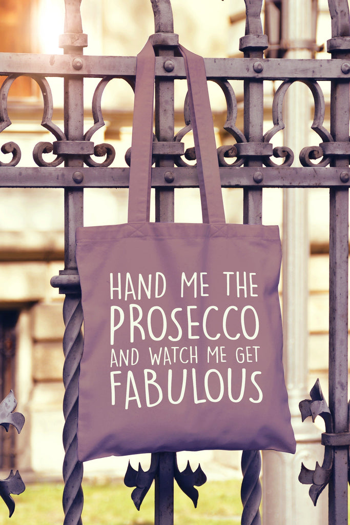 Get trendy with Hand Me The Prosecco And Watch Me Get Fabulous Tote Bag - Tote Bag available at DizzyKitten. Grab yours for £8.49 today!